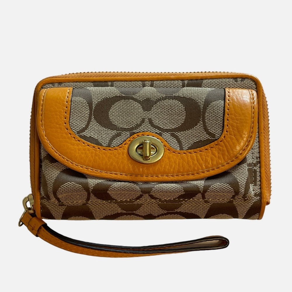 Coach Signature Turn Lock Wristlet in Tan and Orange EUC